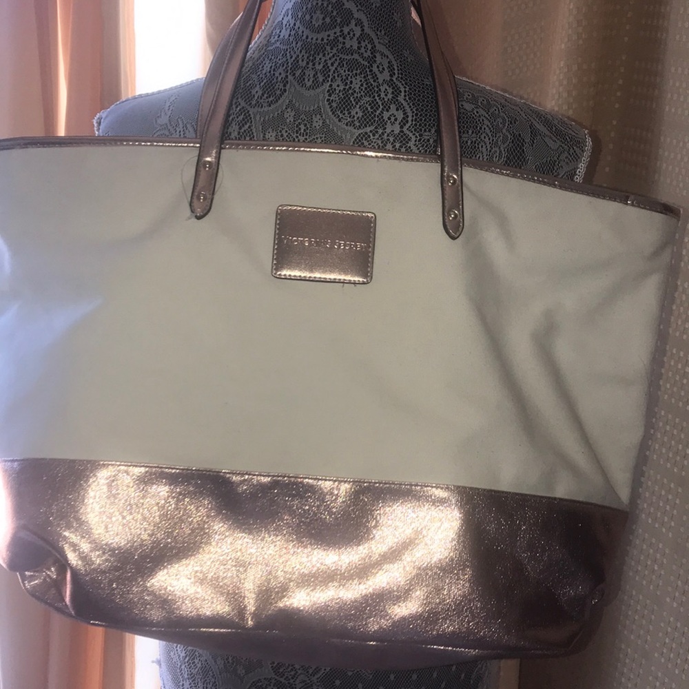 Victoria’s Secret bag.Rose gold and off white